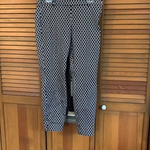 H&M pants size 8. Black, white lattice print. Belt loops. Notched ankle.